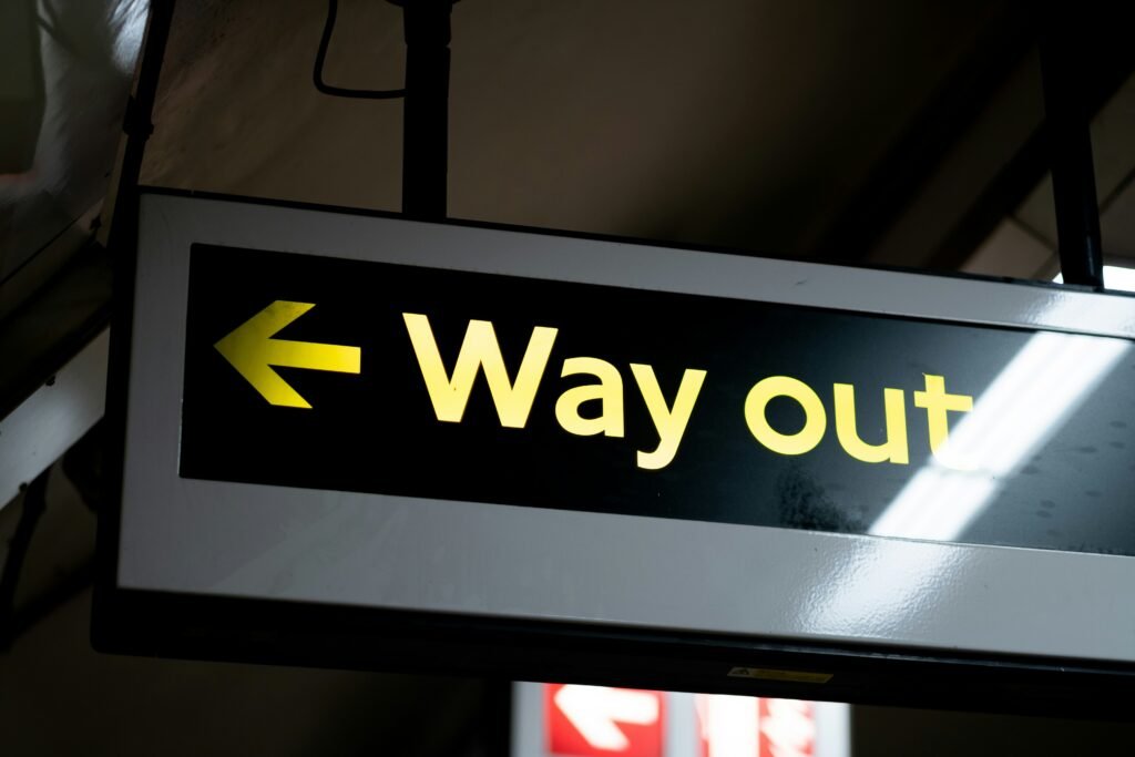 way out / exit sign showing existing trades at a lower than expected amount